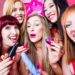 Women having bachelorette party with sex toys in night club
