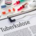 Tuberkulose-Informationsblatt mit medizinischem Zubehör und Arzneimitteln