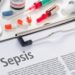 Klemmbrett mit Informationen zu Sepsis und Medikamente