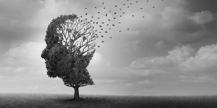 Ein Baum in Form eines menschlichen Kopfes, dessen Blätter im Wind verwehen.