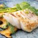Auf Teller angerichtetes Fischfilet