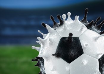 Eine grafische Darstellung eines Fußballs, der die Form eines Coronavirus hat.