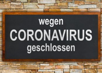 Auf einem Schild steht: Wegen Coronavirus geschlossen.