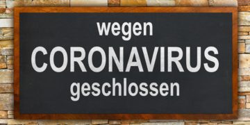 Auf einem Schild steht: Wegen Coronavirus geschlossen.