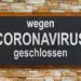 Auf einem Schild steht: Wegen Coronavirus geschlossen.