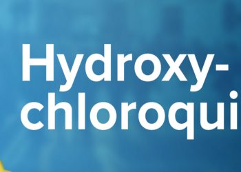 Der Schriftzug Hydroxychloroquin neben einem Mann mit einem Mundschutz