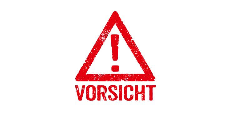 Rotes Ausrufungszeichen mit dem Hinweis "Vorsicht" darunter.