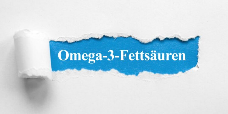 De Schriftzug Omega-3-Fettsäuren unter aufgerissenem Papier