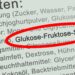 Eine Zustatenliste, auf der das Wort "Glukose-Fruktose-Sirup" rot umrandet ist.