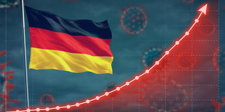 Nach oben steigende Kurve zeigt Coronavirus-Infektionen neben einer Deutschlandfahne