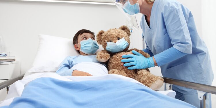 The child with the crown is treated in the hospital.