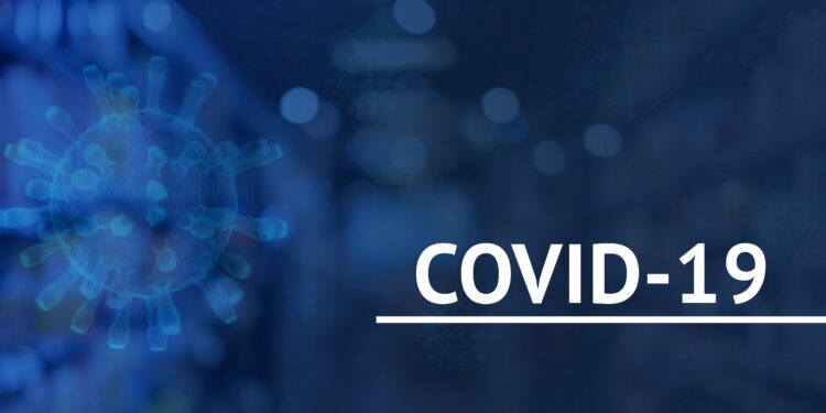 Illustration des Coronavirus neben dem Schriftzug COVID-19