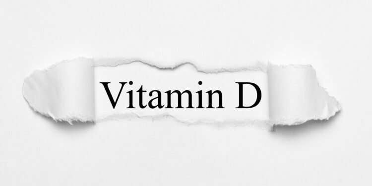 Schriftzug Vitamin D auf weißem Grund.
